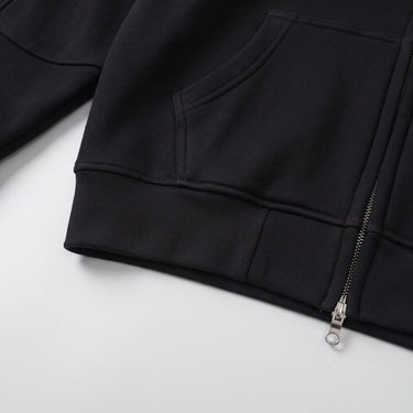 Close-up of the fixed hood and ribbed neckline detail