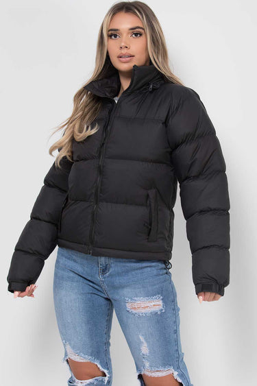 Close-up of the zip-through front fastening and drawstring hood