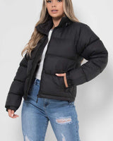 Close-up of the quilted stitching pattern across the jacket body