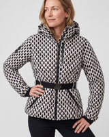 Detail shot of the buckle waist belt on a fitted padded jacket