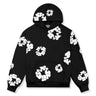 Close-up of floral motif on tracksuit hoodie