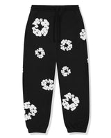 Close-up of elasticated drawstring waistband on tracksuit trousers