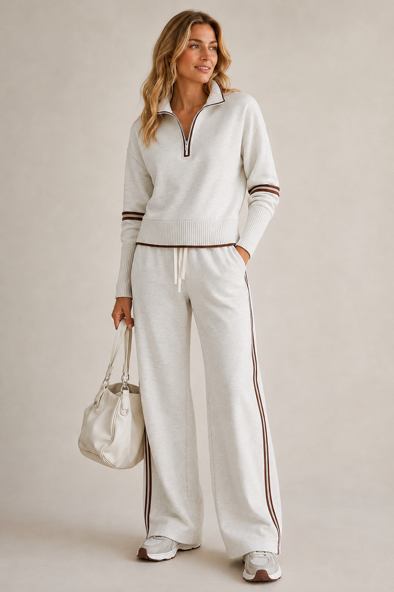 Front view of knitted two-piece set with quarter-zip jumper and wide-leg trousers