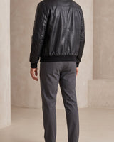 Full-length front view of structured jacket on model