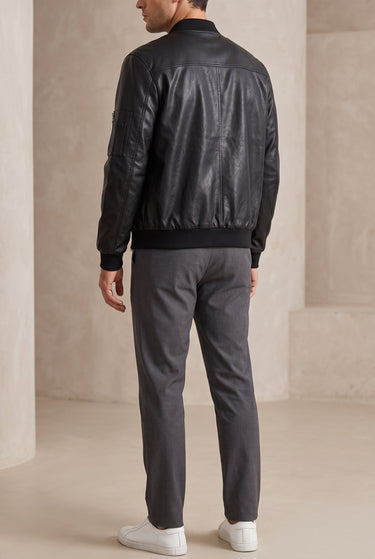 Full-length front view of structured jacket on model