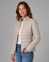 Side profile of the puffer jacket showing the quilted body and zip detail