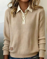 Side view of relaxed-fit lapel jumper showing straight hem and sleeve length