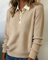 Close-up of button detailing and lapel collar on oversized pullover