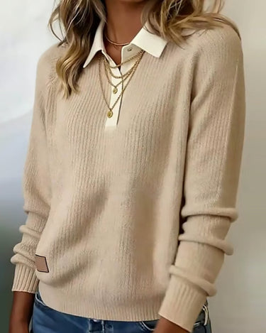 Close-up of button detailing and lapel collar on oversized pullover