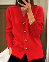 Longline cardigan worn open over a fitted top, showing full silhouette