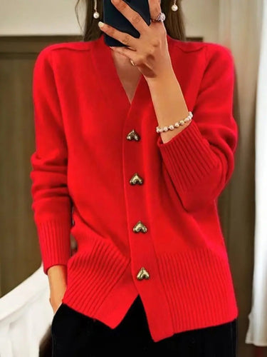 Longline cardigan worn open over a fitted top, showing full silhouette