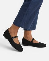 Mary Jane ballet flats worn with tailored trousers, styled outfit shot