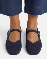 Close-up of buckle closure on ankle strap of Mary Jane flat