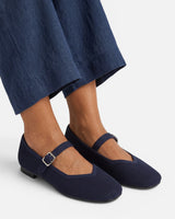 Pair of Mary Jane ballet flats displayed side by side, angled view