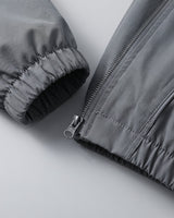 Close-up of ribbed collar and zip fastening on men's baseball jacket