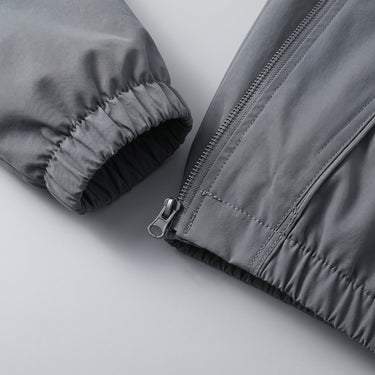 Close-up of ribbed collar and zip fastening on men's baseball jacket