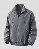 Men's baseball jacket rear view showing short length and ribbed hem