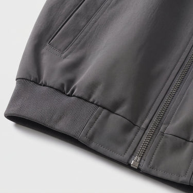 Men's bomber jacket showing structured stand collar close-up