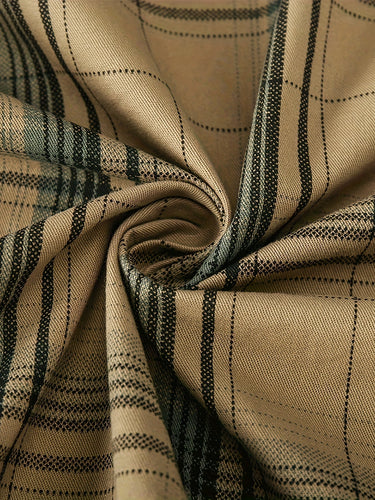Side view of the men's plaid shirt showing the relaxed cut and hem