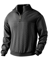 Full-length shot of the men's cable knit jumper in a casual setting