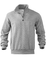Close-up of raised diamond and cable knit texture on the jumper