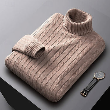 Men's cable knit jumper styled with trousers, three-quarter view