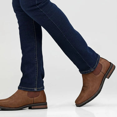 Front view of Chelsea boot displaying western-inspired toe-cap stitching detail