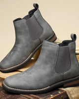 Sole view of men's Chelsea boot showing structured outsole