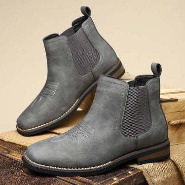 Sole view of men's Chelsea boot showing structured outsole