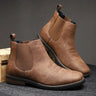 Men's Chelsea boot styled with slim-fit jeans and a shirt