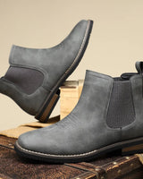 Close-up of elasticated side panel on men's ankle boot