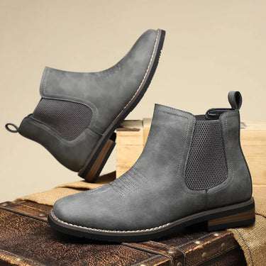 Close-up of elasticated side panel on men's ankle boot