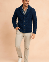 Side profile of the men's chunky knit cardigan showing the ribbed hem