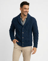 Front view of a men's chunky cable-knit cardigan with shawl collar and button front