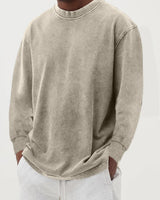 Back view of men's relaxed chunky knit jumper with long sleeves