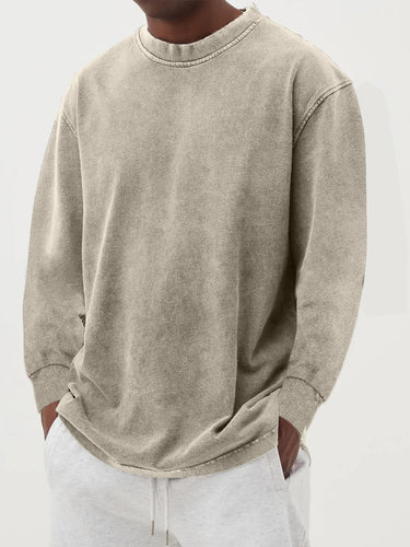 Back view of men's relaxed chunky knit jumper with long sleeves