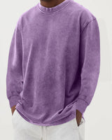 Detail shot of ribbed hem on men's relaxed fit chunky knit jumper