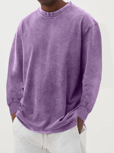 Detail shot of ribbed hem on men's relaxed fit chunky knit jumper