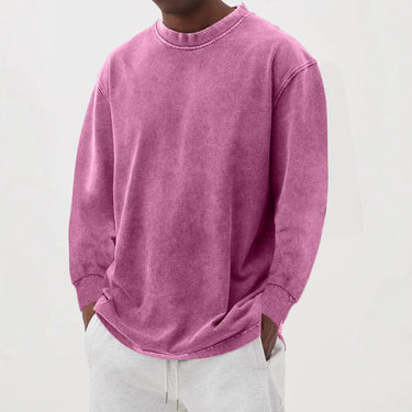 Close-up of chunky knit texture on men's crew neck jumper
