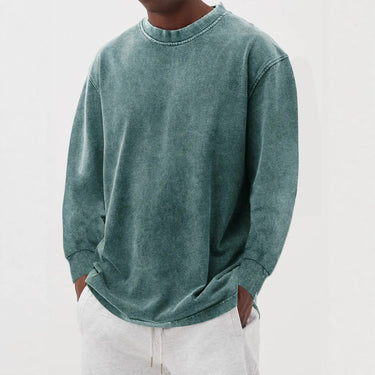 Men's chunky knit jumper worn casually, showing overall relaxed silhouette