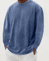 Men's chunky knit jumper with crew neck and dropped shoulders, front view