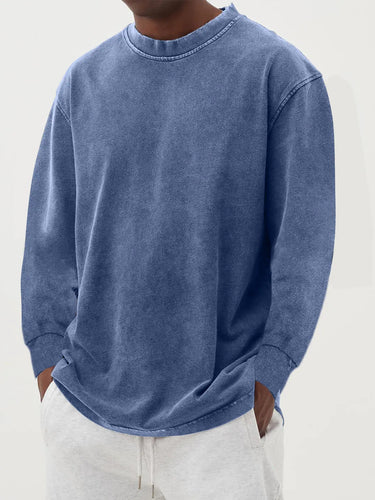 Men's chunky knit jumper with crew neck and dropped shoulders, front view