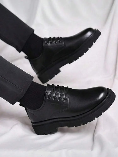 Men's chunky derby boots styled on foot, three-quarter angle view