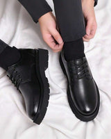Close-up of the chunky treaded sole and low block heel detail