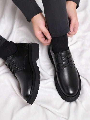 Close-up of the chunky treaded sole and low block heel detail