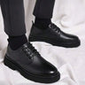 Men's chunky derby boots with lace-up closure and rounded toe, front view