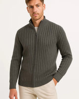 Men's fine knit cardigan worn open over a shirt, side angle view