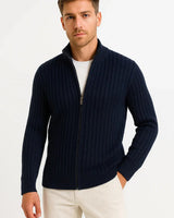 Close-up of ribbed knit texture and button detail on men's cardigan