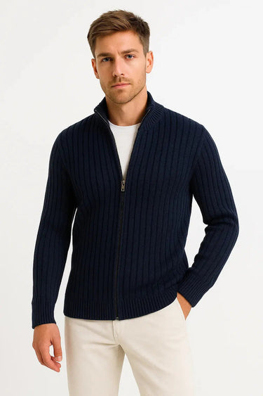 Close-up of ribbed knit texture and button detail on men's cardigan