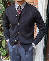 Close-up of the ribbed knit texture and tonal buttons on the cardigan front